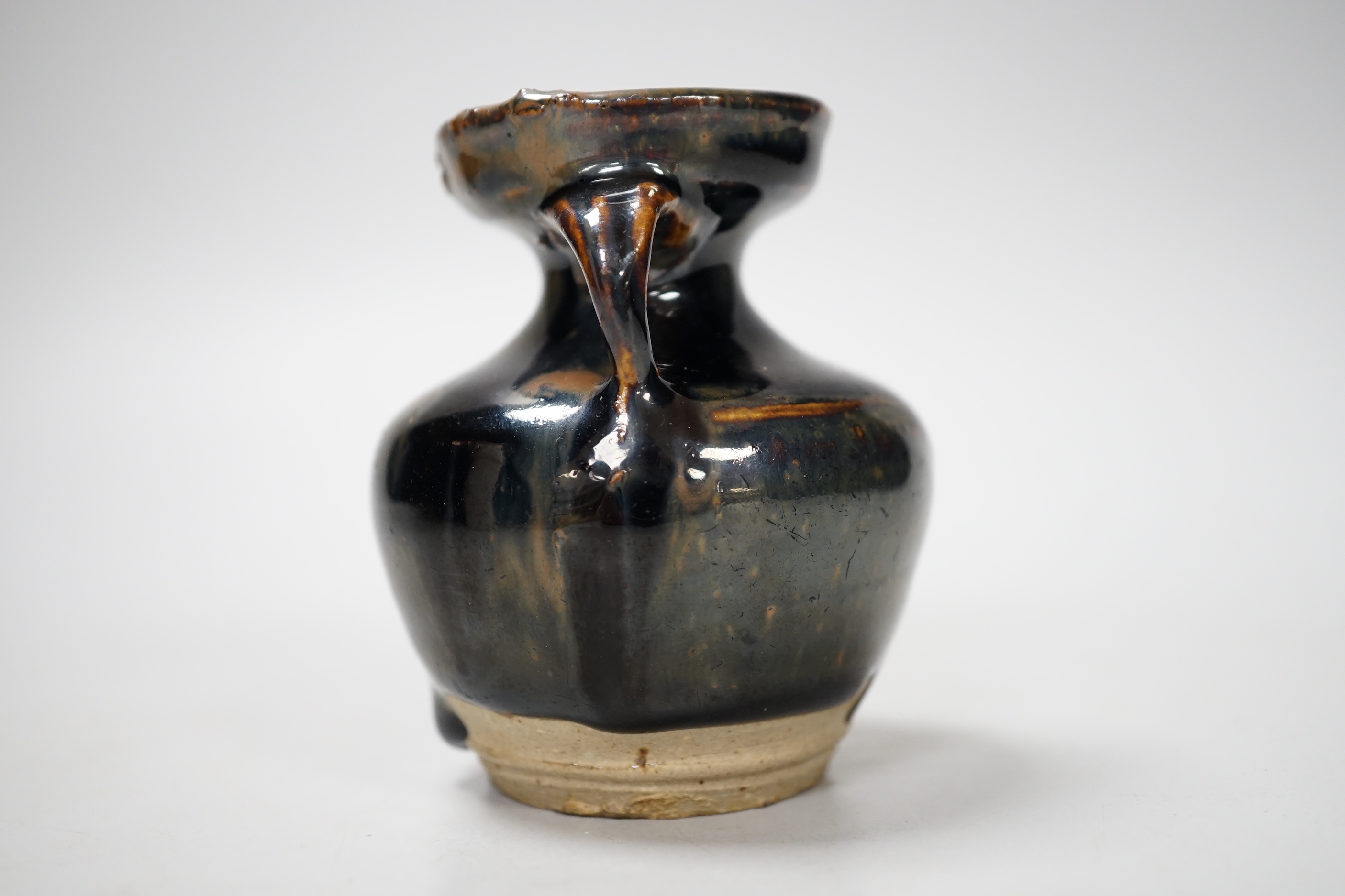 A Chinese Jian type two handled jar, possibly Song dynasty, 8cm high